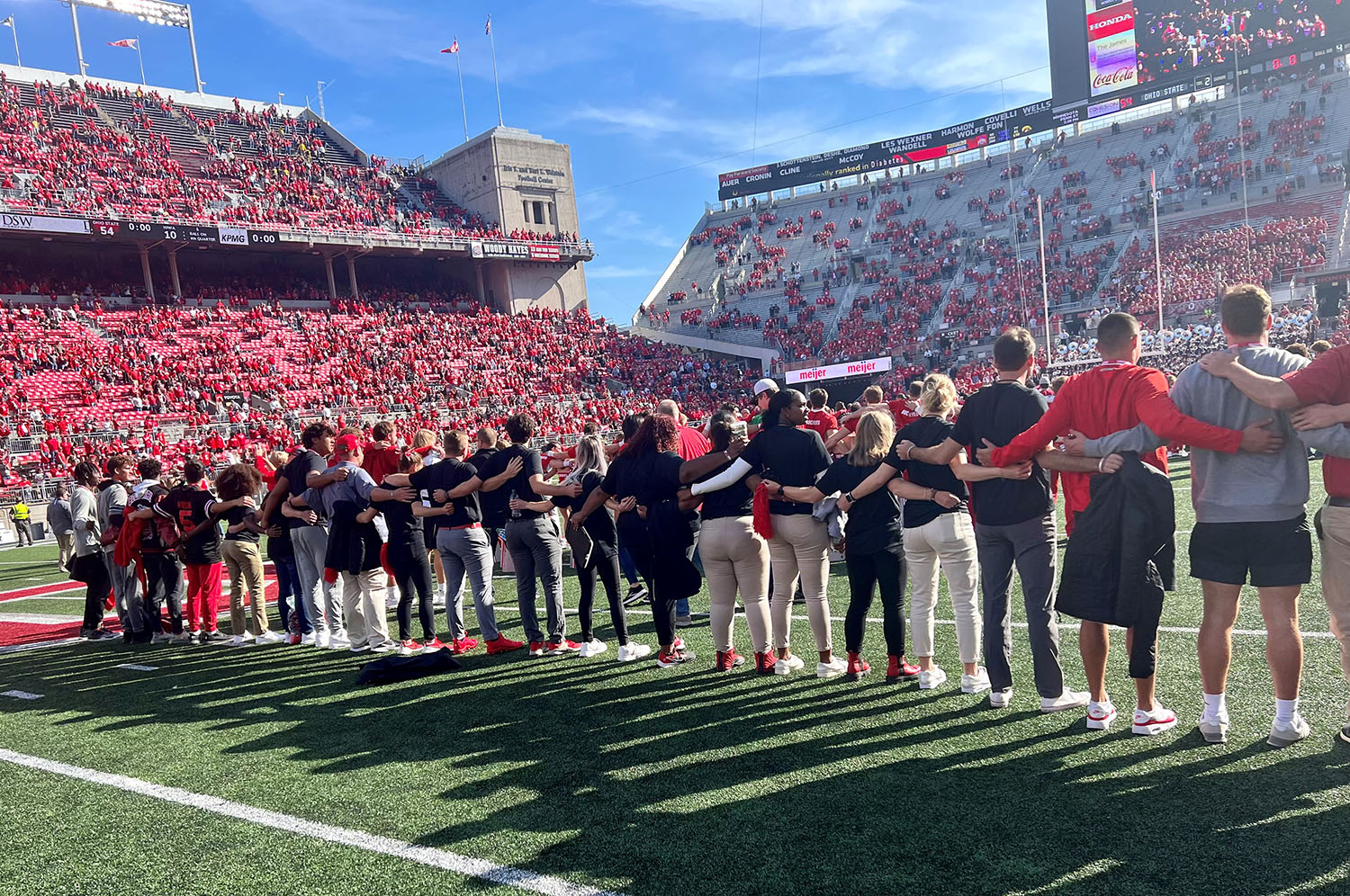 Hosts singing Carmen Ohio on the field of Ohio Stadium after a football game